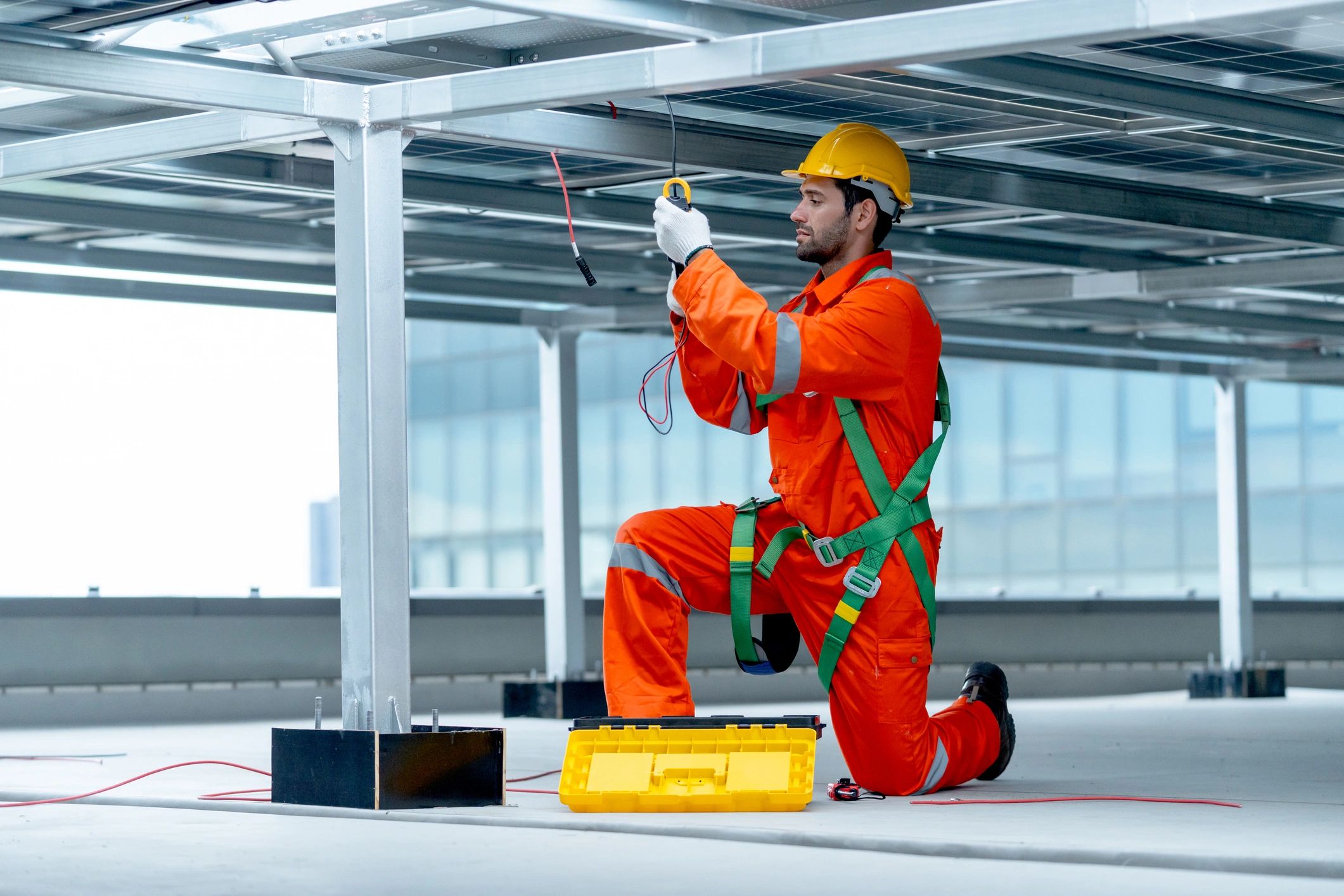 Technician working on commercial rooftop equipment